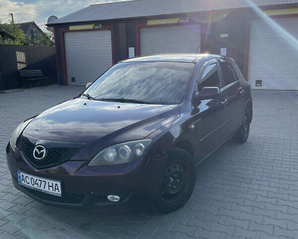 Фиолетовый Мазда 3, объемом двигателя 1.6 л и пробегом 270 тыс. км за 6250 $, фото 1 на Automoto.ua