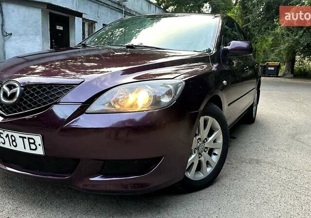 Фіолетовий Мазда 3, об'ємом двигуна 1.6 л та пробігом 335 тис. км за 4999 $, фото 1 на Automoto.ua