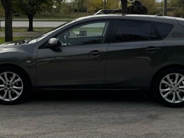 Коричневый Мазда 3, объемом двигателя 1.56 л и пробегом 0 тыс. км за 7200 $, фото 1 на Automoto.ua