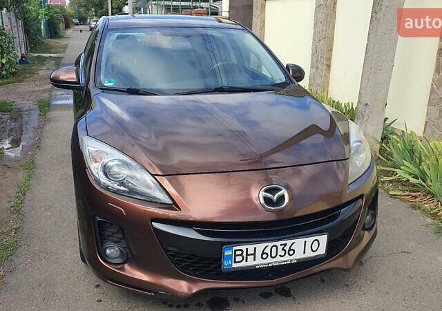 Коричневый Мазда 3, объемом двигателя 2.2 л и пробегом 325 тыс. км за 6800 $, фото 1 на Automoto.ua