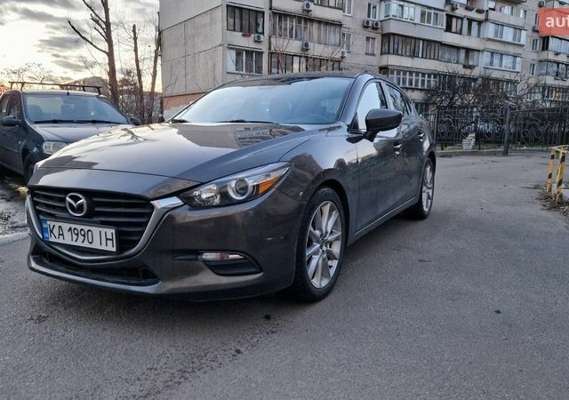 Коричневый Мазда 3, объемом двигателя 2 л и пробегом 80 тыс. км за 12999 $, фото 1 на Automoto.ua