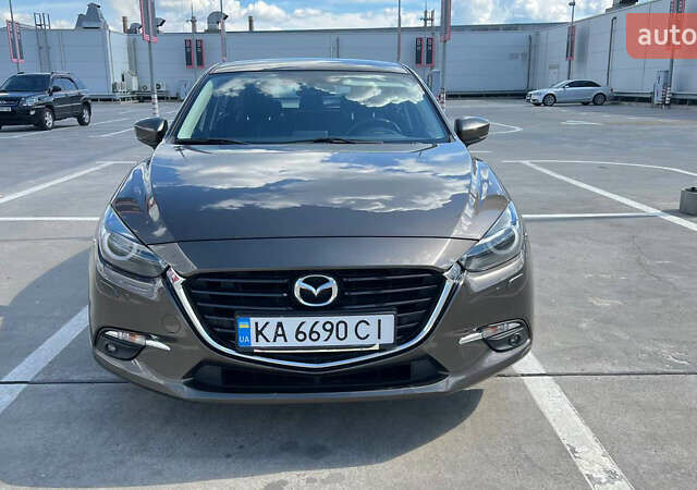 Коричневый Мазда 3, объемом двигателя 1.5 л и пробегом 138 тыс. км за 17500 $, фото 1 на Automoto.ua