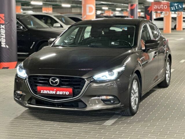 Коричневий Мазда 3, об'ємом двигуна 1.5 л та пробігом 138 тис. км за 16400 $, фото 1 на Automoto.ua