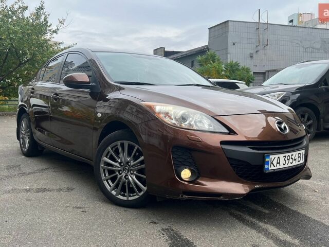Коричневий Мазда 3, об'ємом двигуна 2 л та пробігом 135 тис. км за 9500 $, фото 1 на Automoto.ua