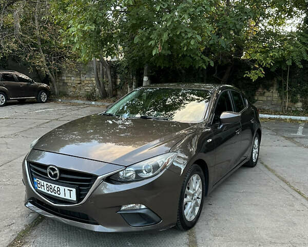 Коричневый Мазда 3, объемом двигателя 2 л и пробегом 175 тыс. км за 10900 $, фото 1 на Automoto.ua