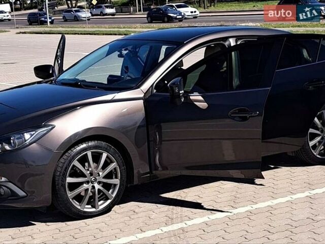 Коричневый Мазда 3, объемом двигателя 2 л и пробегом 109 тыс. км за 12500 $, фото 1 на Automoto.ua