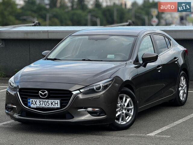 Коричневый Мазда 3, объемом двигателя 1.5 л и пробегом 74 тыс. км за 14900 $, фото 1 на Automoto.ua