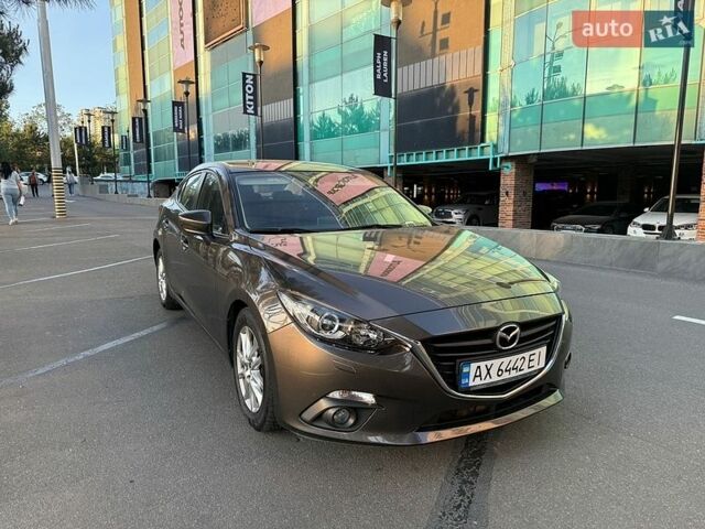 Коричневый Мазда 3, объемом двигателя 1.5 л и пробегом 65 тыс. км за 12900 $, фото 1 на Automoto.ua