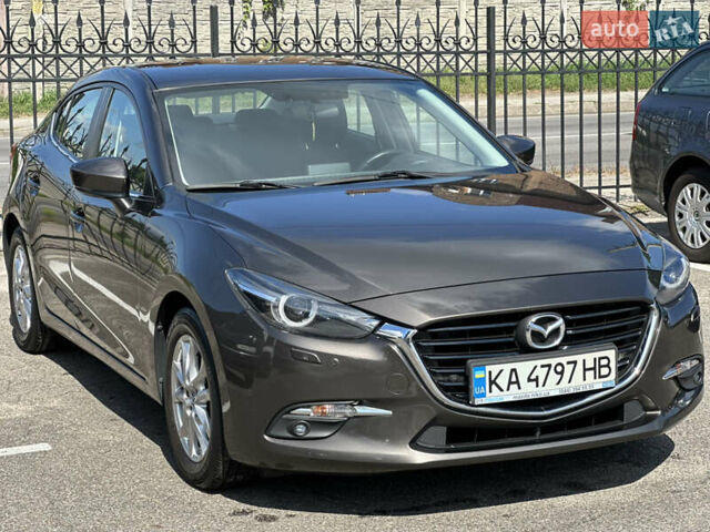 Коричневый Мазда 3, объемом двигателя 1.5 л и пробегом 98 тыс. км за 15900 $, фото 1 на Automoto.ua