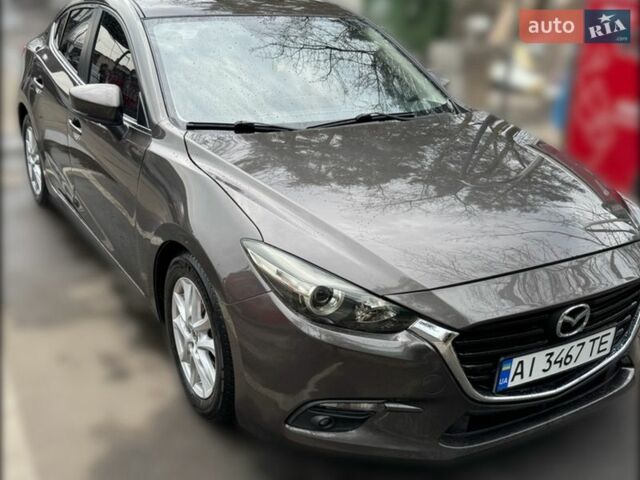 Коричневый Мазда 3, объемом двигателя 1.5 л и пробегом 210 тыс. км за 11300 $, фото 1 на Automoto.ua
