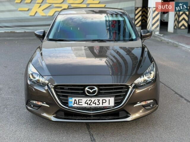 Коричневий Мазда 3, об'ємом двигуна 1.5 л та пробігом 70 тис. км за 13800 $, фото 1 на Automoto.ua
