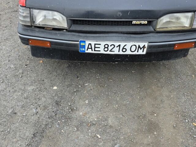 Красный Мазда 3, объемом двигателя 1.6 л и пробегом 380 тыс. км за 800 $, фото 1 на Automoto.ua