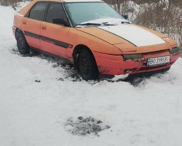 Червоний Мазда 3, об'ємом двигуна 1.6 л та пробігом 460 тис. км за 791 $, фото 1 на Automoto.ua