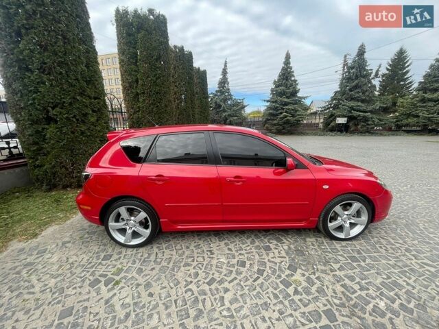 Красный Мазда 3, объемом двигателя 2 л и пробегом 270 тыс. км за 4999 $, фото 1 на Automoto.ua