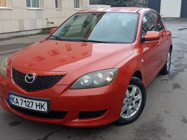 Красный Мазда 3, объемом двигателя 1.6 л и пробегом 172 тыс. км за 3398 $, фото 1 на Automoto.ua