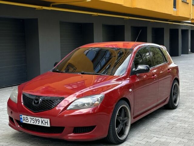 Красный Мазда 3, объемом двигателя 2 л и пробегом 210 тыс. км за 3500 $, фото 1 на Automoto.ua