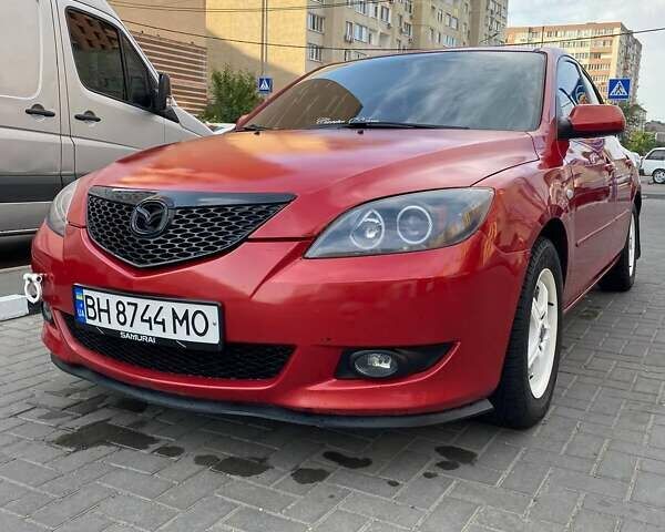 Красный Мазда 3, объемом двигателя 1.6 л и пробегом 304 тыс. км за 4500 $, фото 1 на Automoto.ua