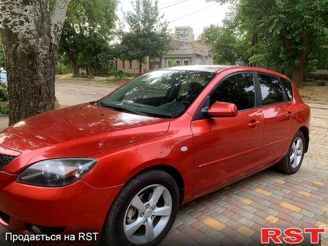 Красный Мазда 3, объемом двигателя 1.6 л и пробегом 235 тыс. км за 4999 $, фото 1 на Automoto.ua