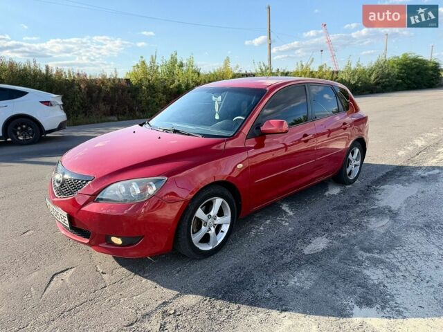 Красный Мазда 3, объемом двигателя 1.6 л и пробегом 280 тыс. км за 3199 $, фото 1 на Automoto.ua