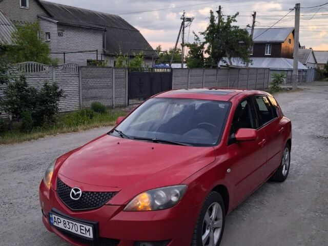 Красный Мазда 3, объемом двигателя 1.6 л и пробегом 260 тыс. км за 4500 $, фото 1 на Automoto.ua