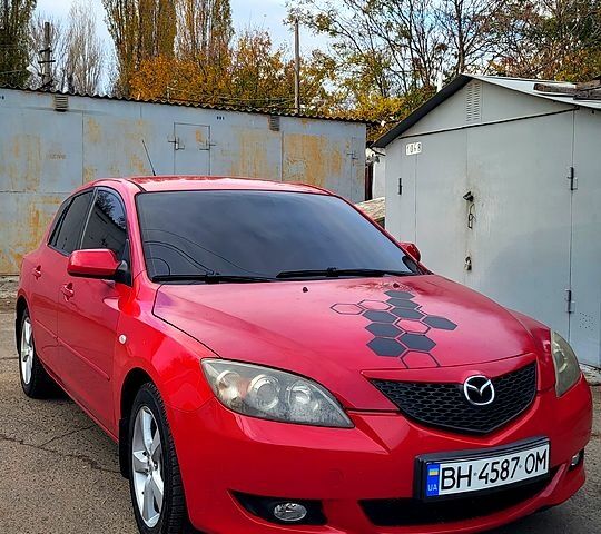 Красный Мазда 3, объемом двигателя 1.6 л и пробегом 174 тыс. км за 4300 $, фото 1 на Automoto.ua