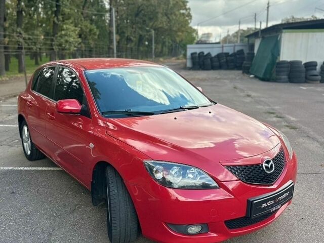 Красный Мазда 3, объемом двигателя 1.6 л и пробегом 215 тыс. км за 5500 $, фото 1 на Automoto.ua