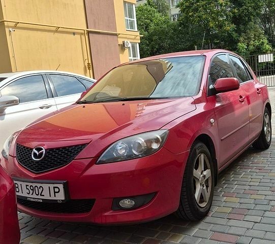 Червоний Мазда 3, об'ємом двигуна 1.56 л та пробігом 220 тис. км за 3300 $, фото 1 на Automoto.ua