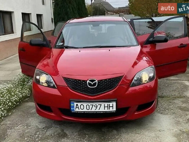 Мазда 3 2005 в Береговом на Automoto.ua Красный Мазда 3, объемом двигателя 1.35 л и пробегом 195 тыс. км за 5100 $, фото 1 на Automoto.ua