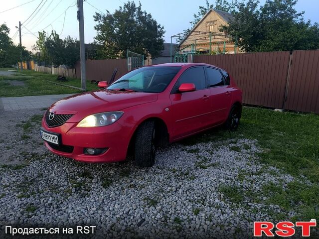 Красный Мазда 3, объемом двигателя 2 л и пробегом 255 тыс. км за 4800 $, фото 1 на Automoto.ua