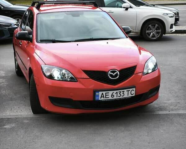 Красный Мазда 3, объемом двигателя 1.35 л и пробегом 215 тыс. км за 7000 $, фото 1 на Automoto.ua