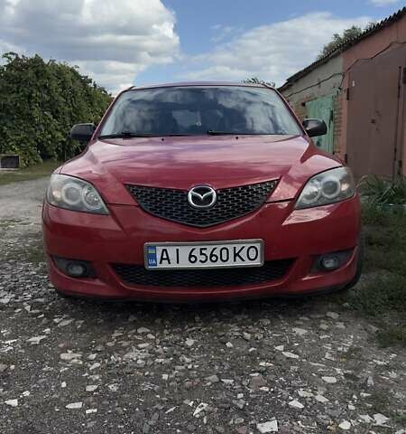 Красный Мазда 3, объемом двигателя 1.6 л и пробегом 216 тыс. км за 4100 $, фото 1 на Automoto.ua