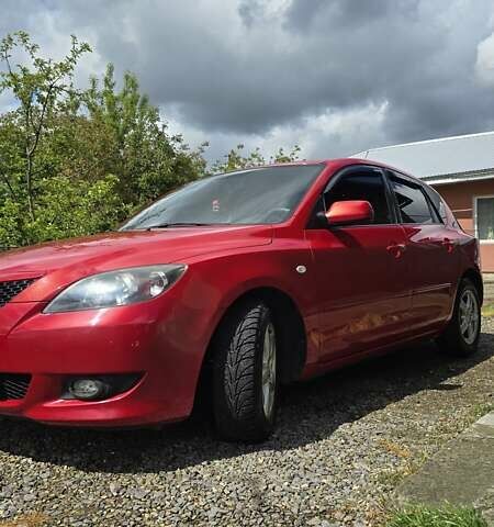 Красный Мазда 3, объемом двигателя 1.6 л и пробегом 205 тыс. км за 4938 $, фото 1 на Automoto.ua