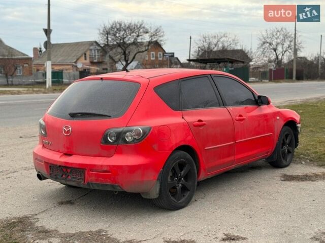 Червоний Мазда 3, об'ємом двигуна 1.6 л та пробігом 299 тис. км за 1999 $, фото 1 на Automoto.ua