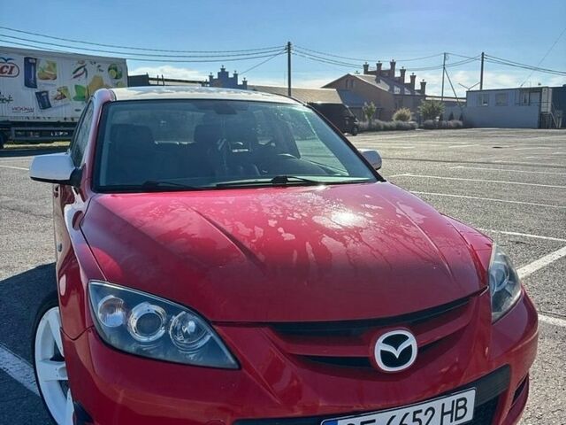 Красный Мазда 3, объемом двигателя 2.3 л и пробегом 110 тыс. км за 6000 $, фото 1 на Automoto.ua