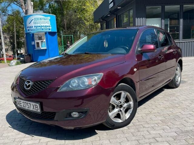 Красный Мазда 3, объемом двигателя 1.6 л и пробегом 314 тыс. км за 4800 $, фото 1 на Automoto.ua