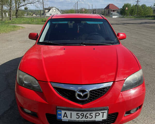 Красный Мазда 3, объемом двигателя 1.6 л и пробегом 214 тыс. км за 4200 $, фото 1 на Automoto.ua