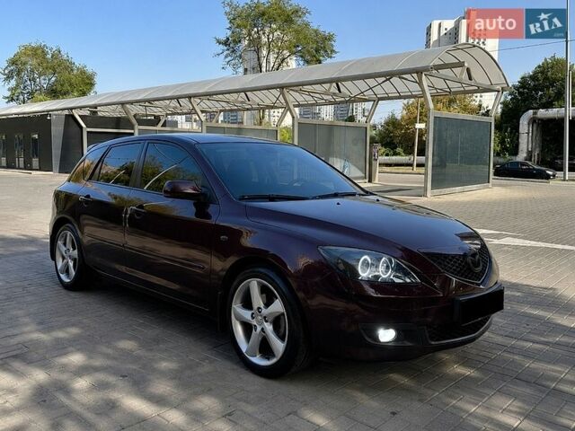 Красный Мазда 3, объемом двигателя 1.6 л и пробегом 143 тыс. км за 6500 $, фото 1 на Automoto.ua