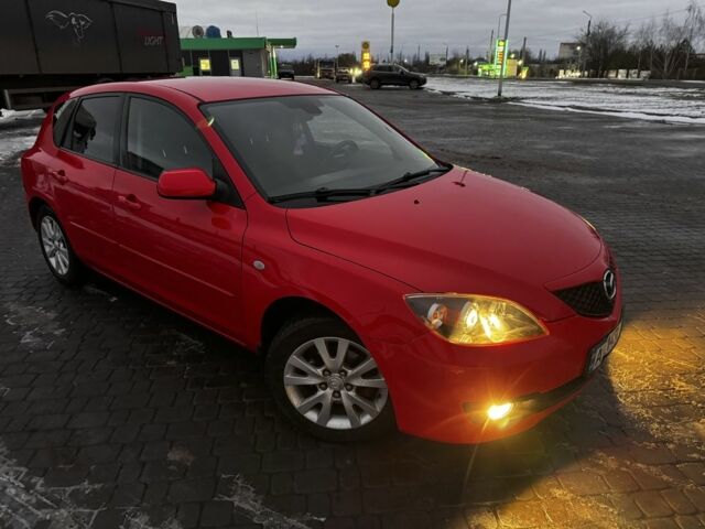 Красный Мазда 3, объемом двигателя 1.6 л и пробегом 232 тыс. км за 5600 $, фото 1 на Automoto.ua