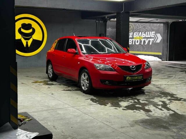Красный Мазда 3, объемом двигателя 2 л и пробегом 261 тыс. км за 5700 $, фото 1 на Automoto.ua