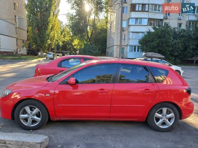 Красный Мазда 3, объемом двигателя 1.6 л и пробегом 190 тыс. км за 6000 $, фото 1 на Automoto.ua