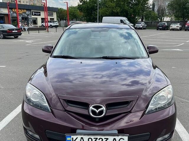 Красный Мазда 3, объемом двигателя 1.6 л и пробегом 195 тыс. км за 5499 $, фото 1 на Automoto.ua