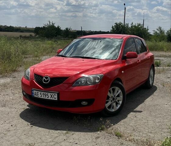 Красный Мазда 3, объемом двигателя 1.6 л и пробегом 264 тыс. км за 5500 $, фото 1 на Automoto.ua