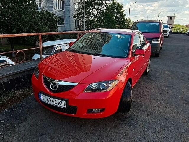 Красный Мазда 3, объемом двигателя 1.6 л и пробегом 61 тыс. км за 5200 $, фото 1 на Automoto.ua