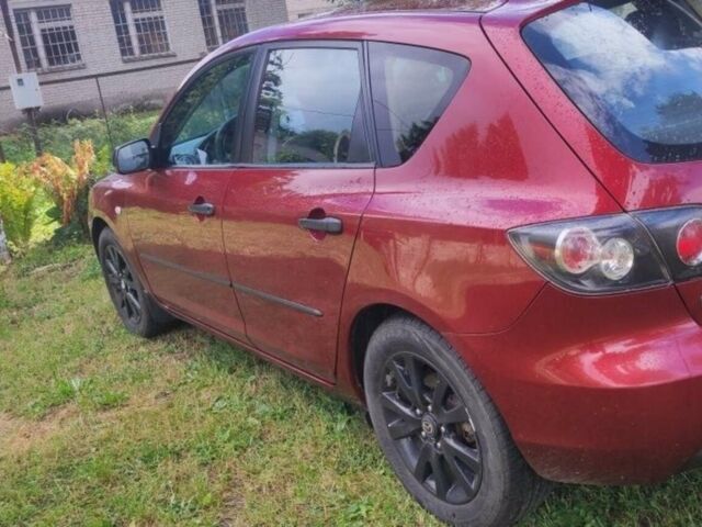 Червоний Мазда 3, об'ємом двигуна 1.4 л та пробігом 310 тис. км за 4100 $, фото 1 на Automoto.ua