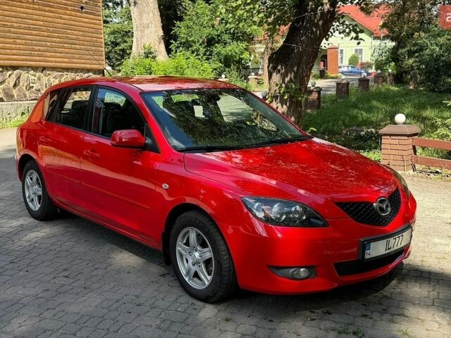 Красный Мазда 3, объемом двигателя 1.6 л и пробегом 310 тыс. км за 5200 $, фото 1 на Automoto.ua