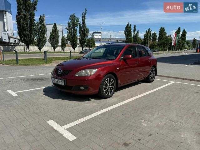 Красный Мазда 3, объемом двигателя 2 л и пробегом 194 тыс. км за 5500 $, фото 1 на Automoto.ua