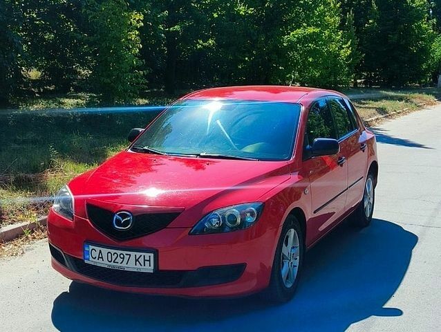 Червоний Мазда 3, об'ємом двигуна 1.4 л та пробігом 262 тис. км за 4900 $, фото 1 на Automoto.ua