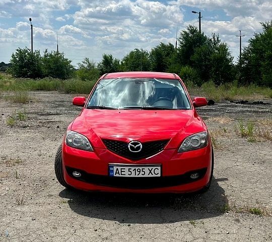 Красный Мазда 3, объемом двигателя 1.6 л и пробегом 264 тыс. км за 5350 $, фото 1 на Automoto.ua