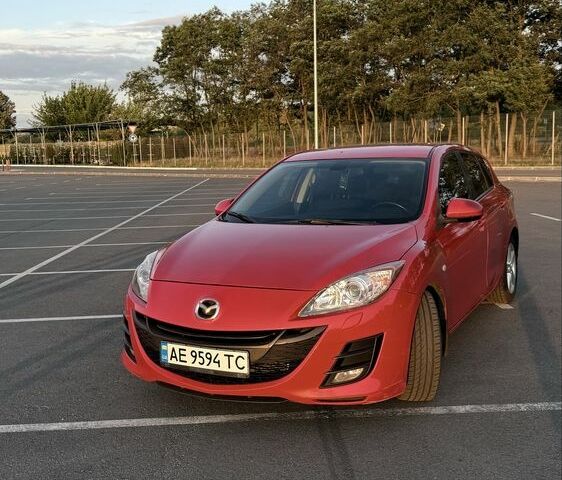 Красный Мазда 3, объемом двигателя 2 л и пробегом 198 тыс. км за 7500 $, фото 1 на Automoto.ua