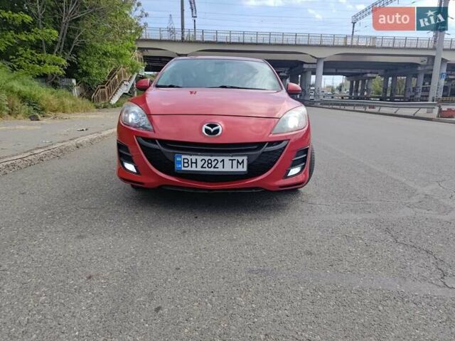 Красный Мазда 3, объемом двигателя 1.56 л и пробегом 300 тыс. км за 6700 $, фото 1 на Automoto.ua